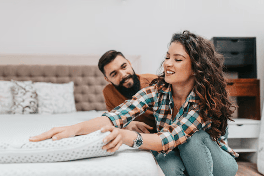 Couple buying a mattress