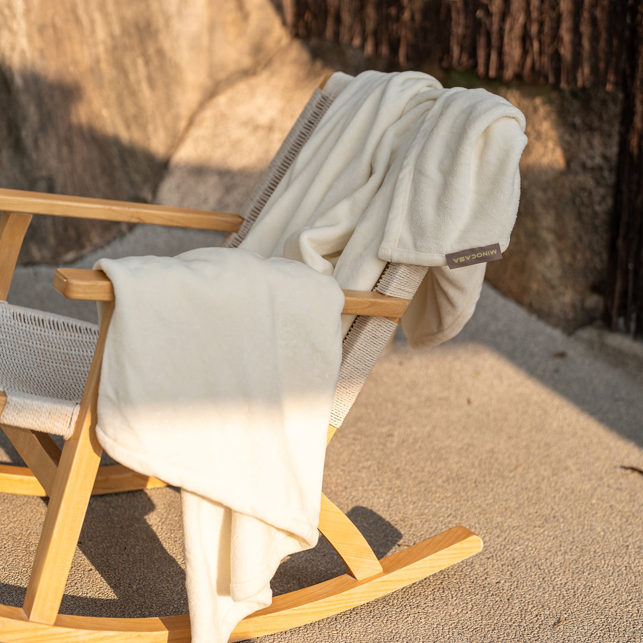 Minocasa Flannel Fleece Oversized Throw Blanket Outside on Chair